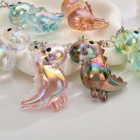 Lindo Llavero De Dinosaurio De Dibujos Animados Acrílico Iridiscente Charm De Bolsa Galvanizado Color Láser Colgante Regalo