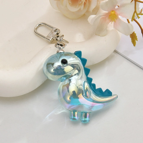 Lindo Llavero De Dinosaurio De Dibujos Animados Acrílico Iridiscente Charm De Bolsa Galvanizado Color Láser Colgante Regalo
