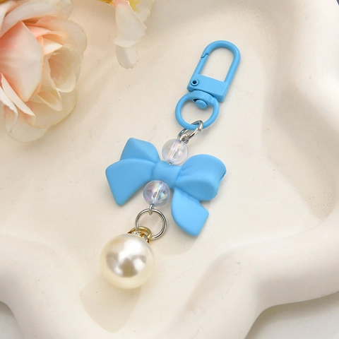 Simpatico Portachiavi Con Fiocco E Künstliche Perle Artificiali Resina Lega Macaron Colorato Ciondolo Per Borsa Telefono Regalo Donna