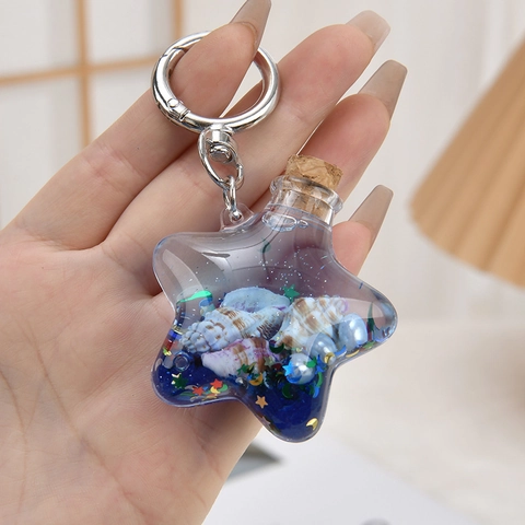 Kreativ Sternform Acryl Muschel Treibflasche Schlüsselanhänger Treibsand Flüssigkeit Schlüsselanhänger Tasche Ornament Student Geschenk