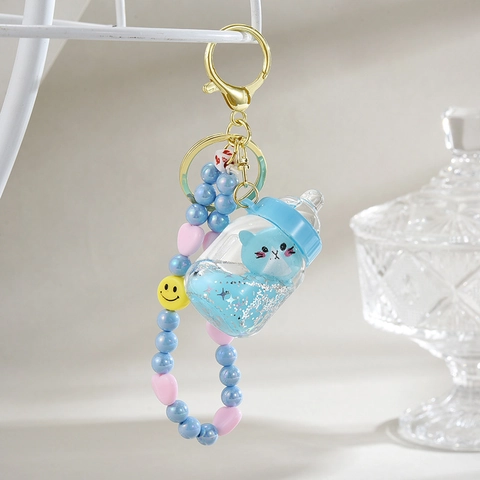 Cute Cartoon Liquid Quicksand Keychain Floating Cat In Baby Bottle Acrylic Beaded Charm Backpack Pendant For Girls Kids
