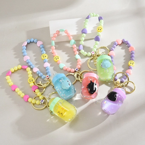 Cute Cartoon Liquid Quicksand Keychain Floating Cat In Baby Bottle Acrylic Beaded Charm Backpack Pendant For Girls Kids