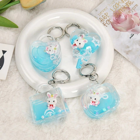 Süßer Cartoon Hase Flüssig Treibsand Schlüsselanhänger Acryl Transparente Flasche Tasche Charm Blau Pailletten Anhänger