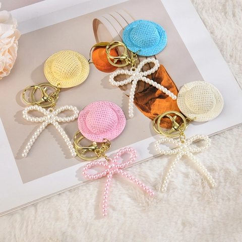 Portachiavi Mini Cappello Di Paglia Con Fiocco Di Künstliche Perle D'Imitazione Catena Di Künstliche Perle Acriliche Ciondolo Per Borsa Kawaii