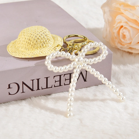 Portachiavi Mini Cappello Di Paglia Con Fiocco Di Künstliche Perle D'Imitazione Catena Di Künstliche Perle Acriliche Ciondolo Per Borsa Kawaii