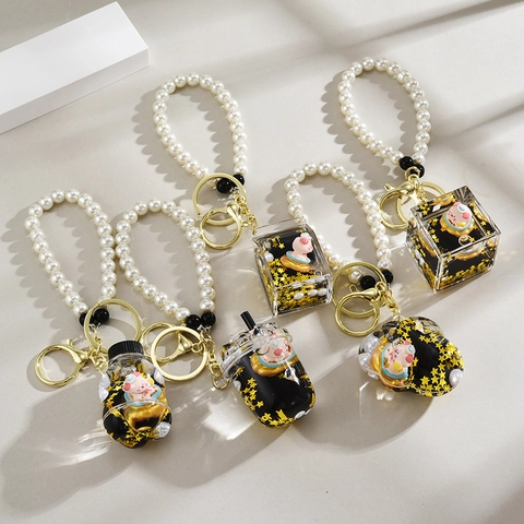 Cute Piggy Liquid Quicksand Keychain Acrylic Moving Star Sequins Bag Charm With Faux Artificial Pearl Strap And Bell For Girls