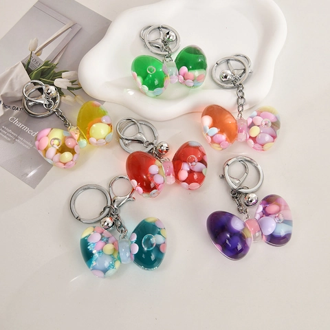 Kreativer Schleife Treibsand Flüssig Schlüsselanhänger Acryl Tasche Anhänger Mit Silberner Glocke Bunte Perlen Süßes Geschenk