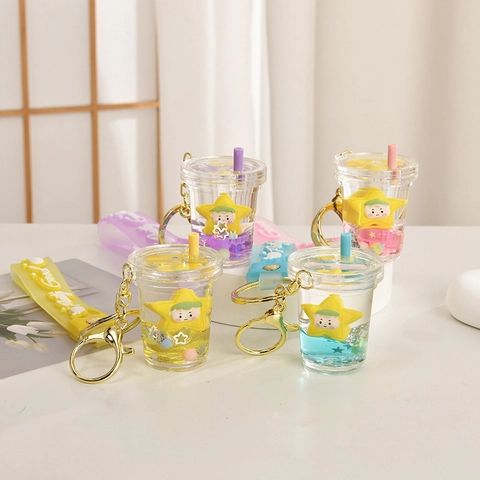 Portachiavi Creativo in Acrilico con Sabbie Mobili Liquide Tazza di Tè con Bambola Stella e Cinturino in Silicone Portachiavi in Metallo Dorato