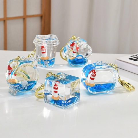 Kreativer Acryl Schlüsselanhänger Blau Treibsand Schwimmender Leuchtturm Segelboot Tasche Anhänger Nautischer Stil Ozean Thema Geschenk
