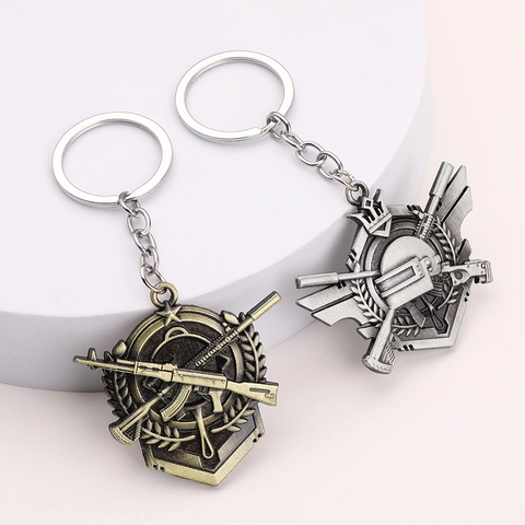 Taktisches Gewehr Medaille Schlüsselanhänger Zinklegierung Spiel Inspiriert Helm Flügel Anhänger Für Rucksack Auto Schlüssel