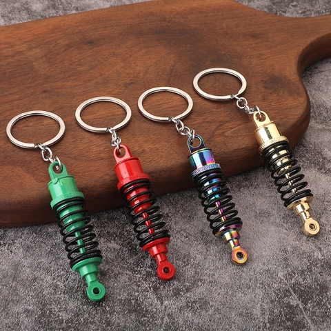 Kreativer Zinklegierung Auto Stoßdämpfer Schlüsselanhänger Simulation Federung Tuning Zubehör Metall Feder Schlüsselanhänger Für Auto Enthusiasten Geschenk