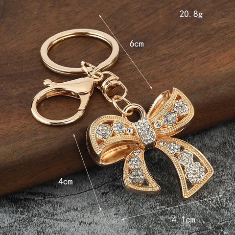 Elegante Portachiavi Con Fiocco In Strass In Lega Di Zinco Finitura Placcata In Oro Ciondolo Per Borsa Da Donna