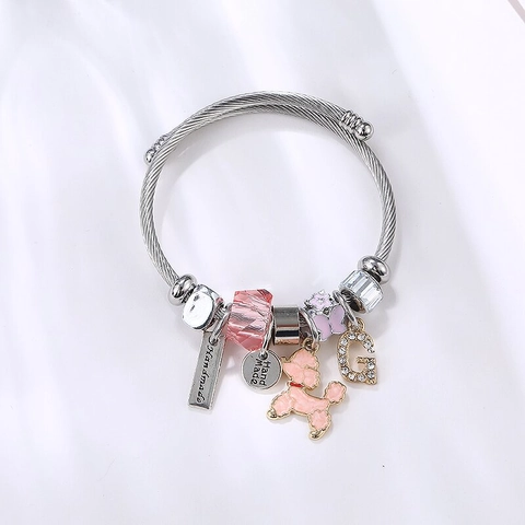 Gedrehtes Drahtmanschettenarmband Edelstahl Legierung Pudel Schmetterling Anhänger Rosa Kristall Strass Armreif Damen