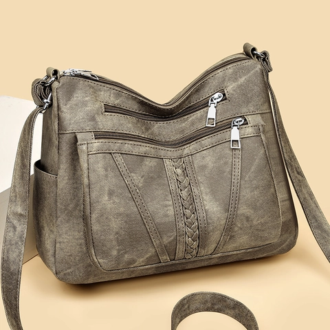 Vintage PU Leather Crossbody Bag For Women Large Capacity Multi Pocket Waterproof Messenger Bag With Woven Decor