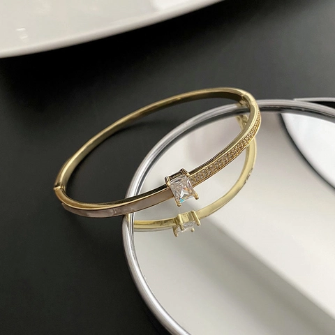 Gold Plated Copper Bangle For Women With Rectangular Cubic Zirconia And White Enamel Inlay Elegant Asymmetrical Jewelry