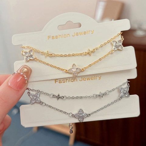 Gelaagde Koperen Armband Met Zirkoon Ingelegd Klavertje Bloem Licht Luxe Elegante Mode Sieraden Dames