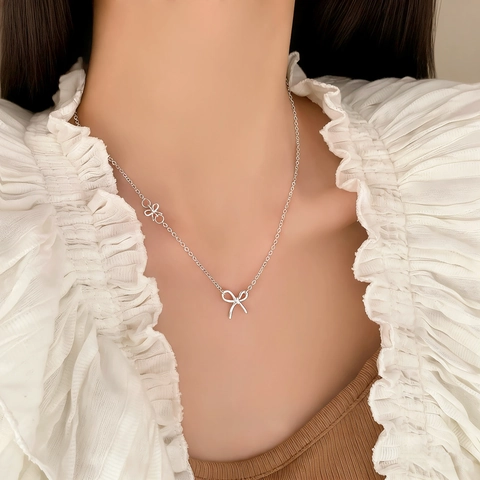 Collar Con Colgante De Lazo De Cobre Plateado Elegante Dulce Doble Nudo De Mariposa Cadena De Clavícula Delgada Para Mujer