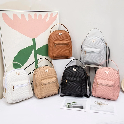 Mini Sac à Dos Femme Mode Cuir PU Matelassé en V Petit Sac à Dos Décor Papillon Casual Voyage Sac à Main Multi-Portage