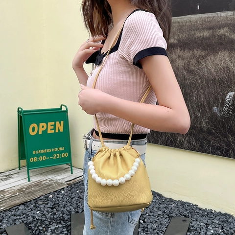 French Style Women Bucket Bag PU Leather Litchi Grain With Large Artificial Pearl Handle Drawstring Crossbody Shoulder Handbag