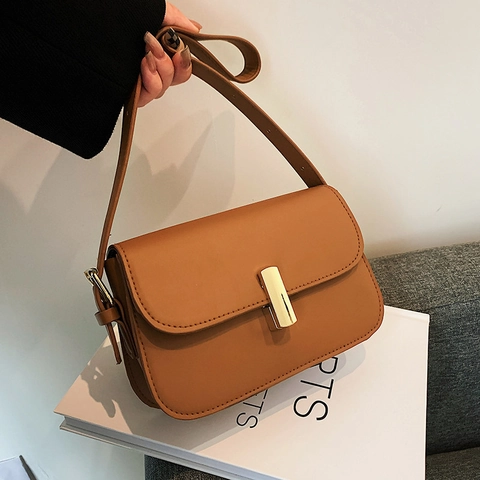Women PU Leather Shoulder Bag Retro Saddle Baguette Bag With Golden Metal Lock Adjustable Strap Minimalist Vintage Bag