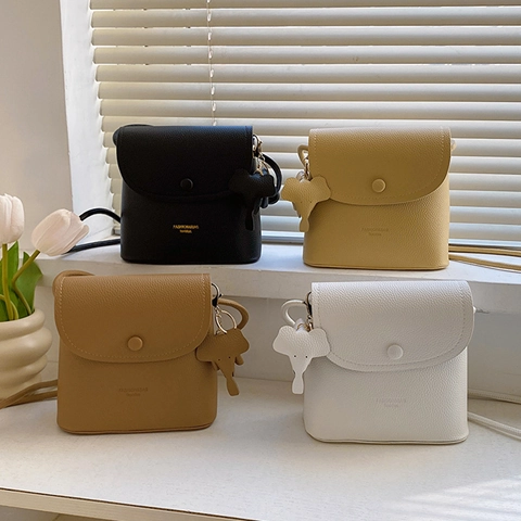 Women PU Leather Crossbody Bag Small Square Shoulder Bag With Woven Strap And Elephant Pendant Solid Color Casual Purse