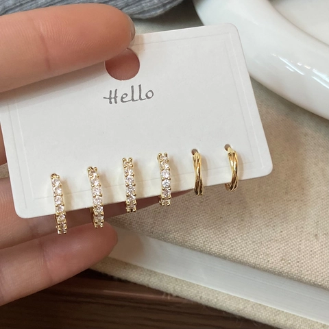 Glänzende Zirkonia Kupfer Creolen Elegante Luxus Schmuck Kollektion Für Damen Gedrehte Textur Gepflasterte Stile