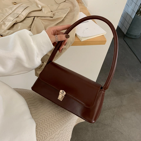 Minimalistische Retro PU Leder Baguettetasche Damen Achsel Umhängetasche Metallverschluss Klappdeckel Elegant Pendelstil
