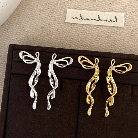 Elegante Schleife Lange Quaste Hängeohrringe Kupfer Vergoldet Mit Zirkonia Für Damen Fluid Metall Stil Schmuck
