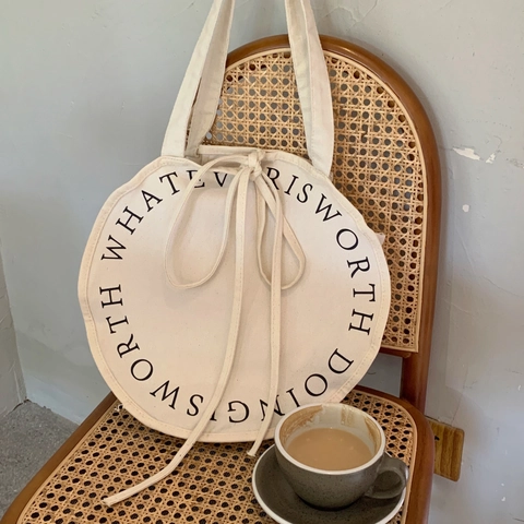Runde Canvas Schultertasche Große Kapazität Kreisförmiger Buchstabendruck Kordelzug Schleife Lässige Koreanische Tragetasche