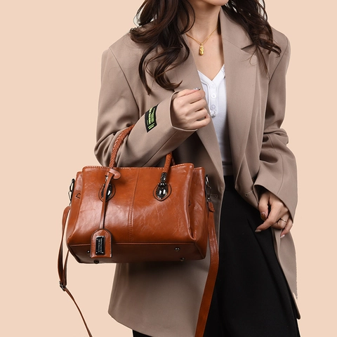 Vintage Öl-Wachs PU-Leder Boston Handtasche Große Kapazität Mehrfachfach Tote Gewebte Griffe Umhängeriemen