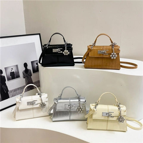 Women Trapezoid Crossbody Bag PU Leather Turn Lock Closure Top Handle Purse With Floral Metal Charm Elegant Fashion Handbag