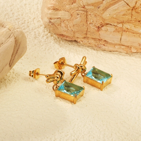 Boucles D'oreilles Pendantes En Acier Inoxydable Noeud Doré 18K Zircon Cubique Bleu Clair Rectangulaire Pour Femmes