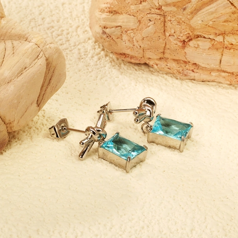 Boucles D'oreilles Pendantes En Acier Inoxydable Noeud Doré 18K Zircon Cubique Bleu Clair Rectangulaire Pour Femmes
