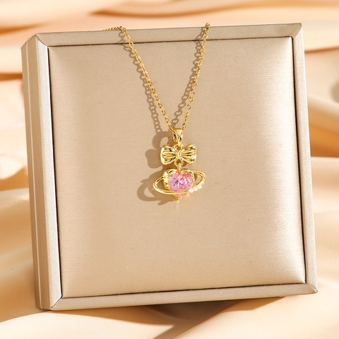 Collana Con Pendente Cuore Fiocco Acciaio Al Titanio Zircone Rosa Saturno Orb Perla Artificial Imitazione Gioielli Per Donne