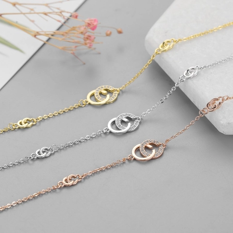 Elegante Pulsera Cobre Chapado En Oro Real Anillos Dobles Entrelazados AAA Zircón Pavé Joyería Mujer Estilo Simple