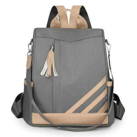 Mochila De Moda Para Mujer Color En Contraste Nylon Cuero PU Borla Antirrobo Desplazamiento Bolso De Hombro Multiusos
