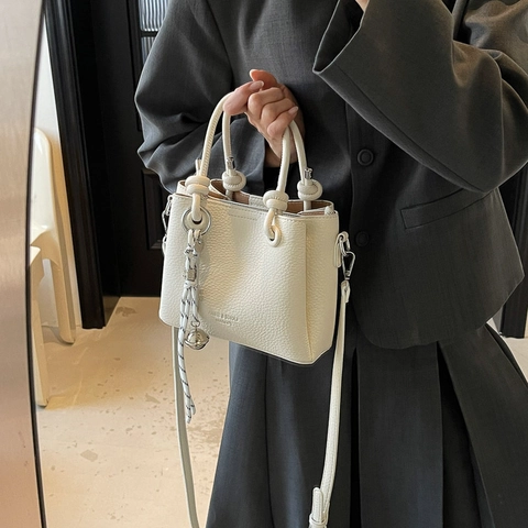 Women Minimalist PU Leather Bucket Bag 2025 New Versatile Crossbody Bag Litchi Texture Top Handle Bag With Braided Rope Charm