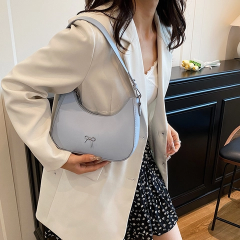 Women Fashion PU Leather Hobo Bag With Metallic Bow Decoration Adjustable Strap Solid Color Crescent Underarm Purse