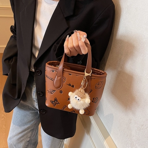 Cute Cartoon Embossed PU Leather Handbag Mini Bucket Tote Bag Contrasting Colors Crossbody Shoulder Bag With Plush Pendant