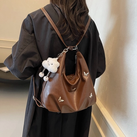Women Casual PU Leather Tote Bag Large Capacity Hobo Shoulder Bag With Metal Butterfly Decor And Cloud Plush Charm