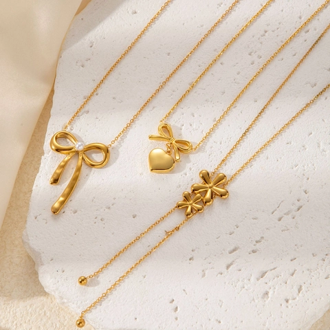Collana In Acciaio Al Titanio Con Ciondolo Fiocco Cuore E Fiore Placcato Oro Perla Artificial Nappa Catena Della Clavicola Elegante