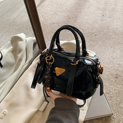 Vintage Women PU Leather Boston Shoulder Bag Retro Glossy Handbag With Triangle Plate And Bell Charm Crossbody Bag For Work