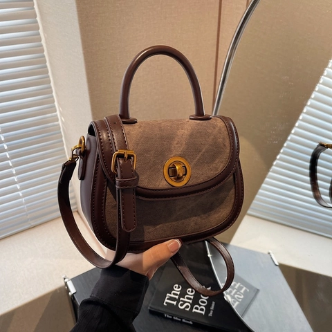 Retro PU Leather Saddle Crossbody Bag For Women Vintage Patchwork Shoulder Bag With Metal Rotary Lock Top Handle Handbag