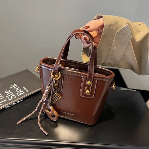 Bolso Cubo de Cuero PU Vintage Casual para Mujer de Alto Brillo al Hombro Bandolera con Amuleto de Ábaco Moda Bolso Diario