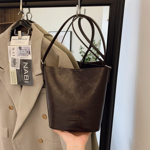 Vintage PU Leather Bucket Bag For Women Retro Solid Color Shoulder Crossbody Bag Minimalist Commuting Handbag With Adjustable Strap