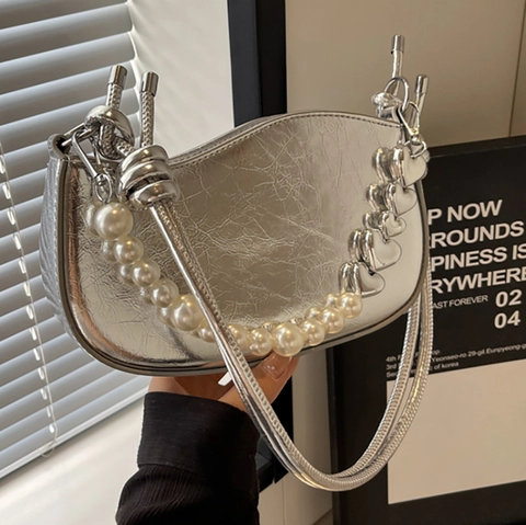 Women Metallic PU Leather Underarm Shoulder Bag With Artificial Pearl Chain Heart Charm Knot Strap Wave Edge Fashion