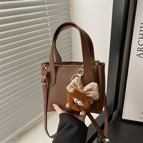 European Vintage Litchi Grain PU Leather Crossbody Bag Small Bucket Style Women Handbag With Monster Charm For Daily Commute