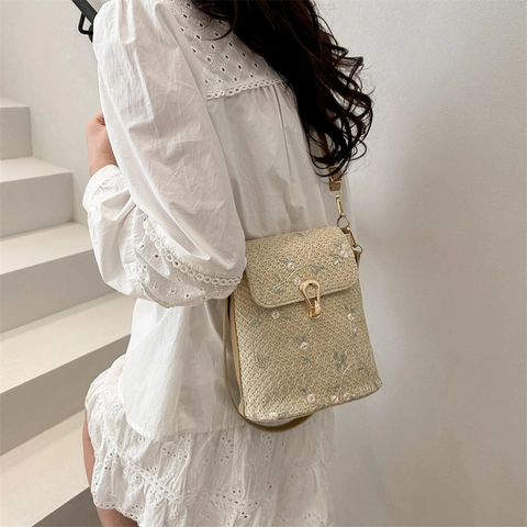 Women Woven Straw Shoulder Bag Floral Embroidery Urban Minimalist Small Square Crossbody Bag With Lock Closure And Leather Strap