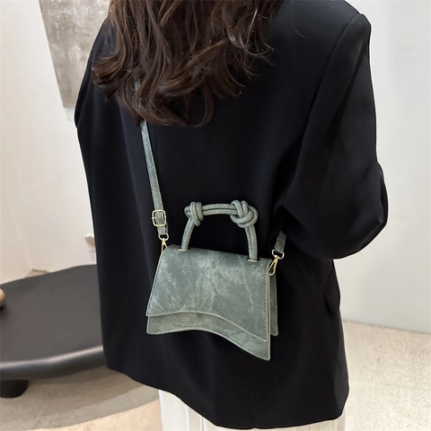 Women Chic PU Leather Shoulder Bag Curved Bottom Knotted Handle Fashion Handbag Minimalist Solid Color Crossbody