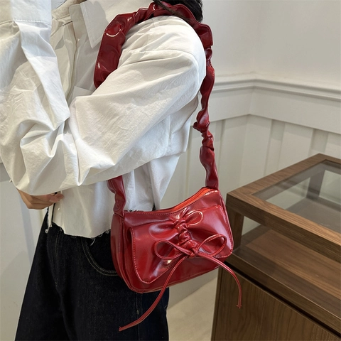 Chic Bowknot PU Leather Shoulder Bag With Ruched Strap Shiny Underarm Bag Trendy Women Handbag Solid Color Crescent Bag Daily Tote